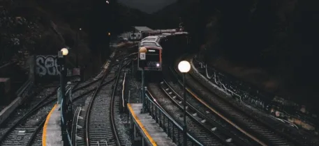 Train on railways during nighttime 716834